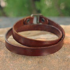 Sleek brown leather becomes a wrap bracelet of powerful elegance. Chaloemphon adds an antiqued brass hook to his trendy new design. Imperial Leather, Brown Bracelet, Italian Jewelry, Leather Wrap Bracelet, Leather Shops, Jewelry Online Shopping, Handcrafted Leather, Artisan Craft, Jewelry Packaging