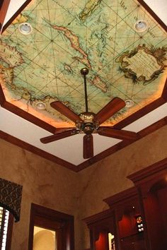 a ceiling with a map on it in a room