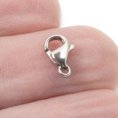 a close up of a person's finger with a ring on it