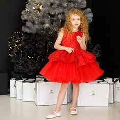 Step into a world of magic and elegance with our Red Sparkling Tutu Dress, designed for young girls who love to shine. Inspired by the wonder of fairy tales and the joy of celebrations, this dress is more than just an outfit; it's a statement piece for those special moments. The shimmering red beaded sequin fabric catches the light, creating a dazzling effect that is perfect for birthdays, Christmas parties, or any festive occasion. Crafted with care, each layer of the red tutu skirt adds volume Princess Style Holiday Dress, Holiday Princess Dress Ball Gown, Princess Style Tulle Holiday Party Dress, Festive Princess Style Tutu Dress, Festive Princess Tutu Dress In Tulle, Princess Style Holiday Dress For Party Season, Princess Tulle Holiday Dress For Christmas, Princess Style Tulle Holiday Dress For Christmas, Princess Ball Gown For Holiday Party