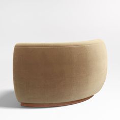 an upholstered chair with a wooden base