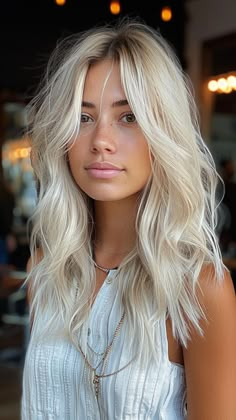 25 Platinum Blonde Hair Color Ideas for Your Enchanting Look White Blonde Balayage Short Hair, Platinum Blonde Hair With Brown Eyes, Lived In Platinum Blonde, Blonde Hair Mid Length, Platinum Short Hair, Cold Blonde Hair, Icy Platinum Blonde Hair, Above Shoulder Hair, Platinum Blonde Hair Color Ideas