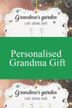 personalised grandma's gift ornament hanging from a christmas tree with butterflies