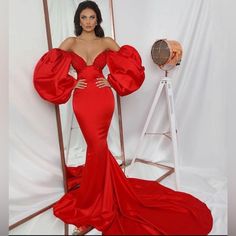 Custom Made From Kosovo. Worn Once. This Vibrant Red Will Streak The Show Because Of Its Old Hollywood Style, Poofy Off The Shoulder Sleeves. Mermaid Cut With A Bit Of Stretch. It Says Size Small But Can Fit A Medium 00-6 Must Have To Win The Crown!!! Stand Out In This Bold, Classic, One Of A Kind Red V-neck Gown For Banquet, Long Sleeve Evening Dress For Red Carpet, Red Carpet Long Sleeve Evening Dress, Red Long Sleeve Evening Dress For Red Carpet, Glamorous Red Satin Evening Dress, Red Fitted Gown With Long Sleeves, Red Satin Evening Dress For Red Carpet, Red Fitted Long Sleeve Gown, Red Long Sleeve Evening Dress With Fitted Bodice