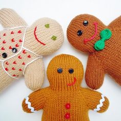 three knitted gingers and an octopus on a white plate