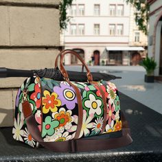 Retro hippie flowers Waterproof Travel Bag, colorful travel luggage, ladies travel gift, PU leather, vintage retro design, carry on, holiday, vacation, overnight bag This personalized travel bag is all about style. Made with high-grade waterproof fabric, it's a highly durable means of transferring your essentials wherever you go. With multiple compartments, a resilient carrying handle, and an adjustable shoulder strap, it's the perfect companion for all your adventures.  .: High-grade nylon mate Multicolor Travel Bag With Luggage Sleeve For Overnight Trips, Multicolor Tote Travel Bag For Overnight Trips, Multicolor Large Capacity Luggage For Trips, Large Capacity Multicolor Duffle Bag For Trips, Large Capacity Multicolor Luggage For Trips, Multicolor Large Capacity Weekender Bag For Overnight Trips, Large Capacity Multicolor Travel Bag, Large Capacity Vintage Weekender Bag For Travel, Multicolor Travel Bag With Luggage Sleeve For Trip