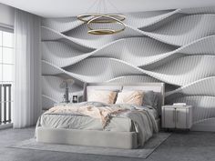 a bedroom with a bed, nightstands and large wall paper in the background that looks like wavy waves