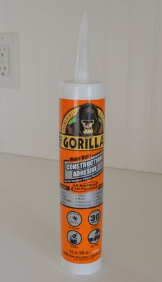 a bottle of gorilla glue sitting on top of a table