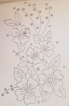 a drawing of flowers with dots in the middle and on the bottom half of it