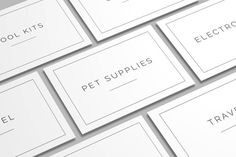 several business cards are stacked on top of each other, with the words pet supplies written across them