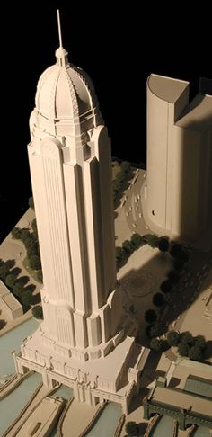 an architectural model of a city with tall buildings