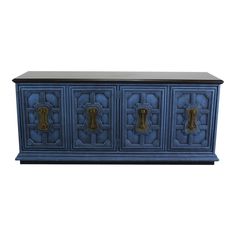 a blue cabinet with gold handles on it