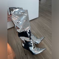 Stunning Metallic Silver Knee High Heeled Boots. Perfect Condition. Never Been Worn. Metallic Knee High Boots, Silver Fitted Knee-high Boots For Fall, Silver Knee-high Evening Boots, Silver Ankle-high Evening Boots, Fitted Silver Ankle-high Boots, Silver Leather Knee-high Boots, Silver Boots, High Heeled Boots, High Heel Boots Knee