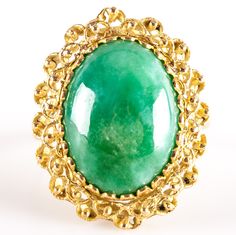 18k Yellow Gold Oval Cabochon Jade Solitaire Cocktail Ring 6.38gMetal Information: 18k Yellow GoldTotal Weight: 6.38gBand Width: 1.95mmSize: 6.5Stone InformationMain StoneGem Type: JadeShape: Oval Cabochon (16mm x 12mm)Color: GreenClarity/Quality: ANumber of Stones: 1Estimated Retail Price: $2005.00OUR PRICE: $1600.00SizingMany of our pieces can be re-sized at the buyers request. Please email us if you require our skilled professional services.45683 Formal Oval Cabochon Opal Ring, Oval Cabochon Opal Ring In Fine Jewelry, Oval Cabochon Opal Ring Fine Jewelry, Fine Jewelry Oval Cabochon Opal Ring, Oval Yellow Gold Cabochons For Formal Events, Yellow Gold Oval Cabochon Gemstones, Formal Oval Cabochon Emerald Ring, Formal Emerald Cabochon Ring, Oval Opal Ring With Stone Setting For Formal Occasions