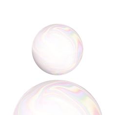 two white marbles on a white background