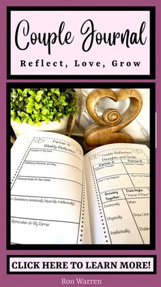 an open book sitting on top of a table next to a vase and potted plant