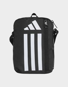 Tote your training gear in style. This durable adidas shoulder bag offers a main compartment with an inner divider to keep you organised. Zip your phone and other essentials into the front pocket, and you're good to go. The shoulder strap adjusts for comfortable carrying, and prominent 3-Stripes branding offers a sporty finish.Made with a series of recycled materials, and at least 40% recycled content, this product represents just one of adidas' solutions to help end plastic waste.• Dimensions: 5 cm x 15 cm x 21 cm• 100% polyester (recycled)• Zip main compartment• Front zip pocket• Hanging loop• Inner divider• Adjustable shoulder strap Stripes Branding, Training Gear, Student Discounts, Plastic Waste, Jd Sports, Black Adidas, Recycled Materials, Front Pocket, Zip Pockets