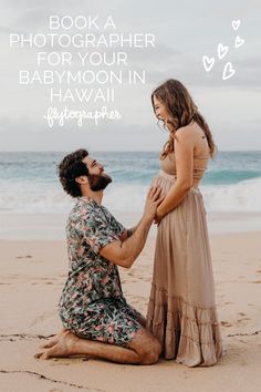 a man kneeling down next to a woman on the beach with text reading book a photographer for your babymoon in hawaii