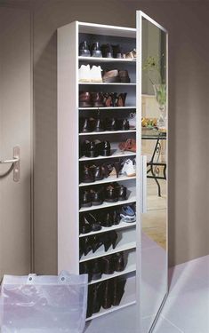 the shoe rack has many pairs of shoes on it