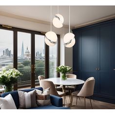 a living room filled with furniture and lots of windows