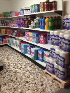 a store filled with lots of different types of baby wipes and toilet paper on shelves