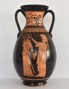 an old vase with two people standing next to each other on the side of it