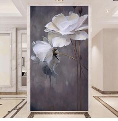 a painting of white flowers on a wall in a room with marble floors and walls