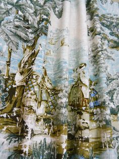 the curtain is decorated with an image of two people riding horses and a man on horseback