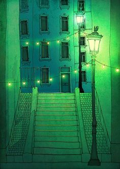 a green building with lights on it and stairs leading up to the top of them