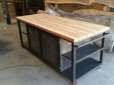 a workbench made out of metal and wood