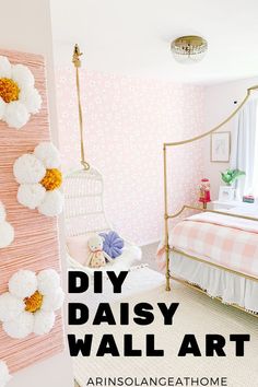 a pink and white bedroom with flowers hanging on the wall, and text overlay that reads diy daisy wall art