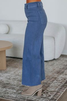 Details: Linsley Wide Leg Pants High Rise Zip Fly Button Closure Wide Leg Denim Material Minimal Stretch Raw Edge Frayed Hems Available in Multiple Colors Rise: 12" Inseam: 28" Material: 98% Cotton and 2% Spandex We are recommending: Small - Sizes (24-25) Medium - Sizes (26-27) Large - Sizes (28-29) Athleisure Shorts, Scarf Shirt, Overalls Pants, Curvy Jeans, Denim Material, Shoes With Jeans, Blue Pants, Wide Leg Denim, Slate Blue