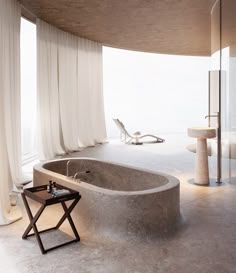 a large bathtub sitting in the middle of a room next to a window with white drapes