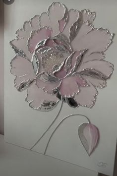 a white card with pink flowers on it