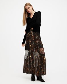 We're keeping soft bohemian styling on our radar for autumn. The Bryn Skirt is crafted from a lightweight conscious fabric in an intricate panelled design featuring black lace and sheer printed panels that are framed with embellished seams. Cut to an easy fitting maxi length with a straight hem and shorter internal lining. Move into seasonal dressing and pair this with chunky knitwear and oversized leathers.   This skirt is designed to a regular fit Zip closure Maxi length Straight hem Panelled design Lace detailing Printed mesh design Embellished trims Mini length lining Lightweight Recycled fabrics This style has been hand embellished by skilled artisans. Due to the delicate nature of this technique, beads may loosen over time. Please take extra care when possible. Sweater Outfits Fall, Embellished Skirt, Maxi Rok, Sheer Skirt, Chunky Knitwear, Going Out Outfits, Sweaters And Jeans, Guest Outfit, All Saints