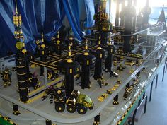 a model of a city made out of legos and other construction equipment is shown