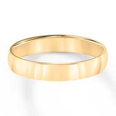 a yellow gold wedding ring on a white background, with the top half facing towards the camera