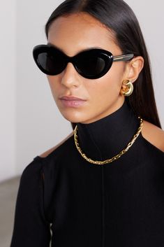 Oliver Peoples and Khaite's collaboration blends some of our favorite vintage and modern styles. These '1968C' sunglasses nod to the classic cat-eye but with a softened, more oval shape. Truly timeless, they're made from black acetate with gold-tone arms. Tone Arms, Porter Bag, Oliver Peoples Sunglasses, Lux Life, Tortoiseshell Sunglasses, Italian Sunglasses, Round Eyewear, Flat Dress Shoes, Toned Arms