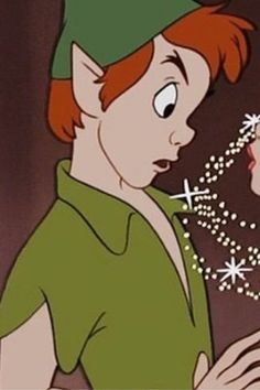 an animated character with red hair and green shirt looking at snowflakes in her hand