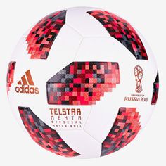 a soccer ball with red and black designs on it's side, in front of a white background