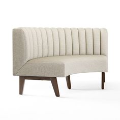 an upholstered couch with wooden legs and a curved backrest, on a white background