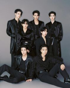 the members of exo pose for a group photo in black outfits and leather jackets