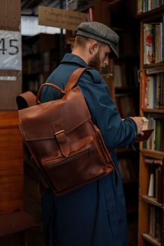 Model Douglas Explore timeless style and rugged durability with our Vintage Leather Backpack. Crafted from premium brown leather, this backpack offers a classic design that suits both men and women. Its spacious interior and sturdy construction make it perfect for daily use, travel, or outdoor adventures. Personalize it with initials for a unique touch, making it an ideal gift for him or her. Whether you're looking for a stylish rucksack or a practical leather bag, this hipster backpack combines Brown Leather Backpack With Pockets For Outdoor, Classic Leather Backpack With Pockets For Everyday Use, Brown Backpack With Pockets For Adventure, Brown Adventure Backpack With Pockets, Leather Adventure Backpack With Pockets, Leather Backpack With Pockets For Adventure, Classic Backpack With Pockets For Daily Use, Brown Backpack With Multiple Pockets For Outdoor, Brown Outdoor Backpack With Multiple Pockets