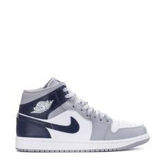 The Air Jordan 1 Mid Shoe draws heritage style from the OG 1985 AJ1 and delivers a modern-day, elegant street-style lure. One in every color, for everyone, and every day, the AJ 1 Mid shoe offers much more than just style and comfort; it provides a deep-rooted connection to basketball history, street-style culture, and neighborhoods worldwide. Features: Mid-top silhouette. Leather, synthetic leather, and textile upper for a supportive feel. Iconic winged Air Jordan logo on the upper for traditio Traditional Branding, Air Jordan Logo, Basketball History, Soccer Shop, Jordan Logo, Black And White Sneakers, Shoes Drawing, Just Style, Heritage Fashion