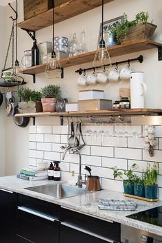 a kitchen with shelves filled with pots and pans