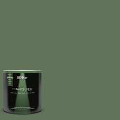 a can of behr marquee green paint