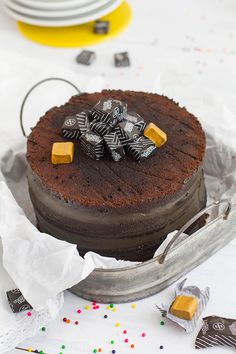 a chocolate cake sitting on top of a table