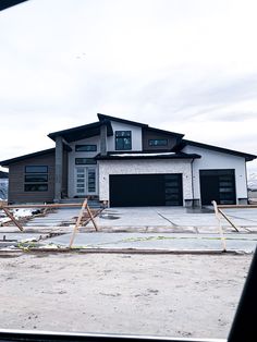 a large house is being built in the middle of nowhere