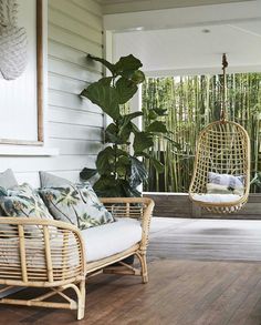 the porch is clean and ready for guests to use it as an outdoor lounge area