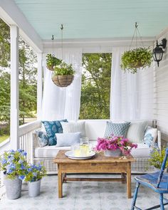 an outdoor living room is featured in the country home journal's july 2013 issue